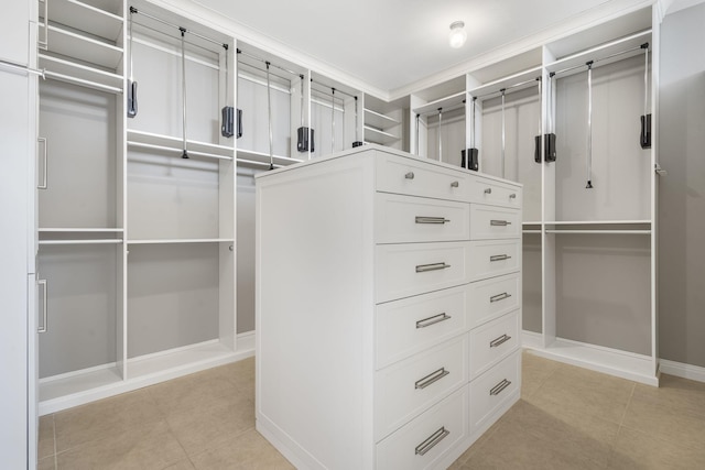 walk in closet featuring light tile patterned floors