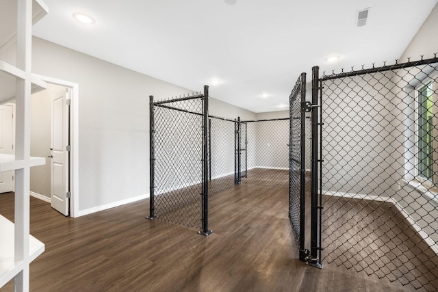 interior space featuring visible vents, dark wood-style flooring, baseboards, and recessed lighting