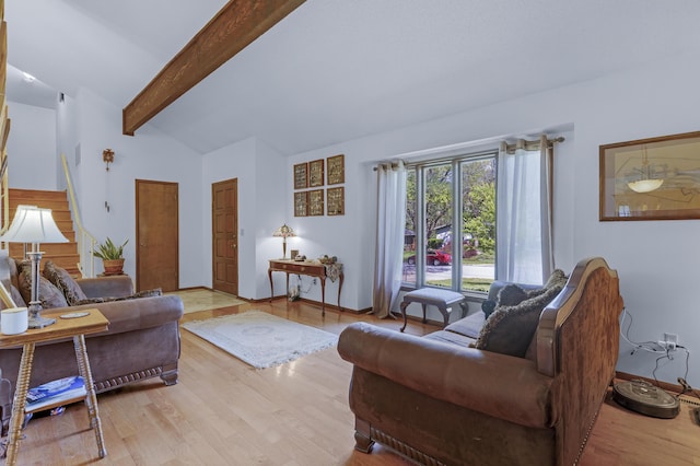 2941 S Versailles Ave, Springfield, MO 65804 - living room with baseboards, vaulted ceiling with beams, and wood finished floors