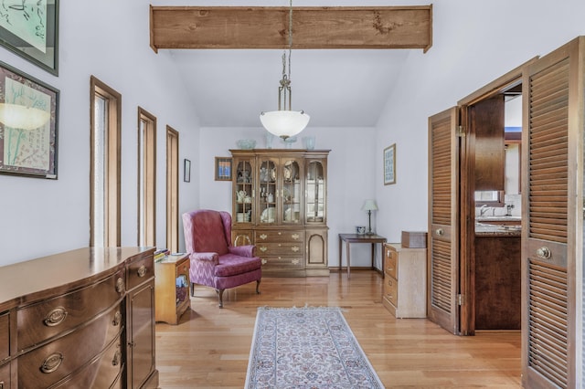 2941 S Versailles Ave, Springfield, MO 65804 - sitting room featuring light wood-type flooring and vaulted ceiling with beams