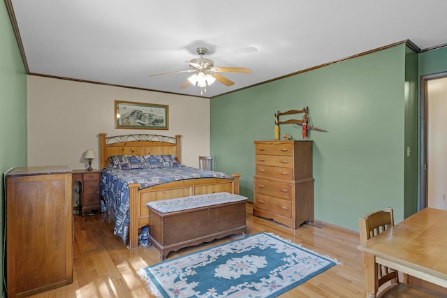 2941 S Versailles Ave, Springfield, MO 65804 - bedroom with a ceiling fan, crown molding, and wood finished floors