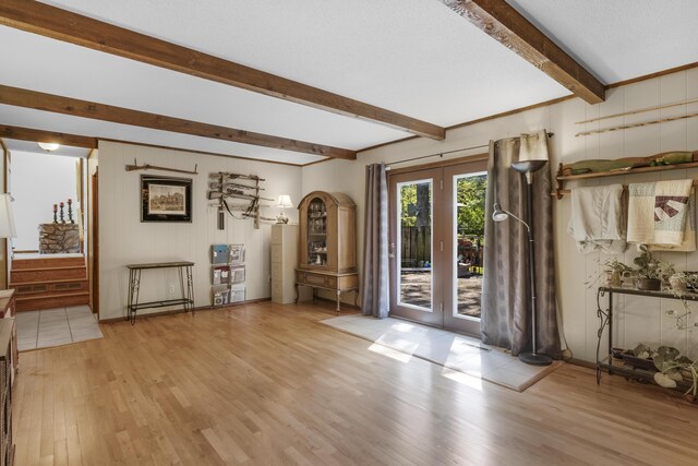 2941 S Versailles Ave, Springfield, MO 65804 - entryway with light wood-type flooring, french doors, and beam ceiling