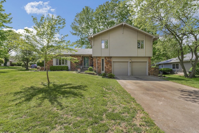 2941 S Versailles Ave, Springfield, MO 65804 - split level home with concrete driveway, an attached garage, and a front yard