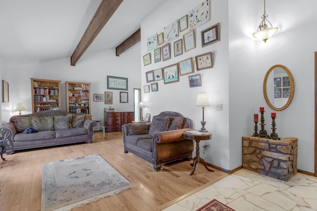 2941 S Versailles Ave, Springfield, MO 65804 - living area with wood finished floors, baseboards, high vaulted ceiling, and beam ceiling