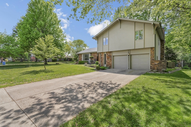2941 S Versailles Ave, Springfield, MO 65804 - tri-level home featuring a front lawn, brick siding, an attached garage, and concrete driveway