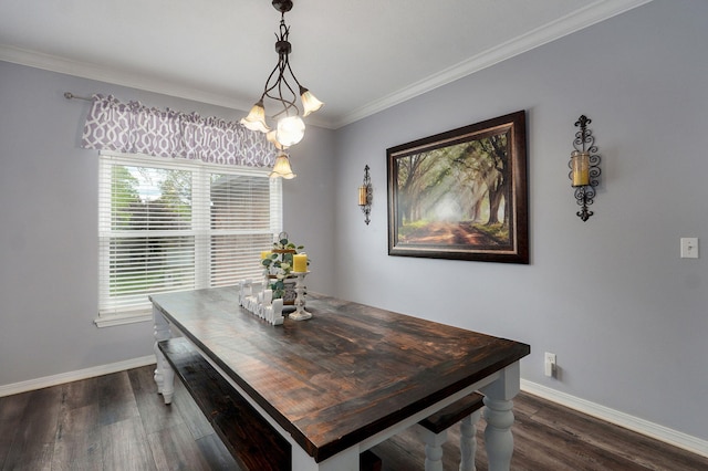 dining area with dark wood-type flooring, baseboards, ornamental molding, and a notable chandelier