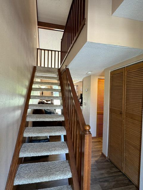 17 Fall Creek Trl Unit 7, Branson, MO 65616 - stairs with wood finished floors