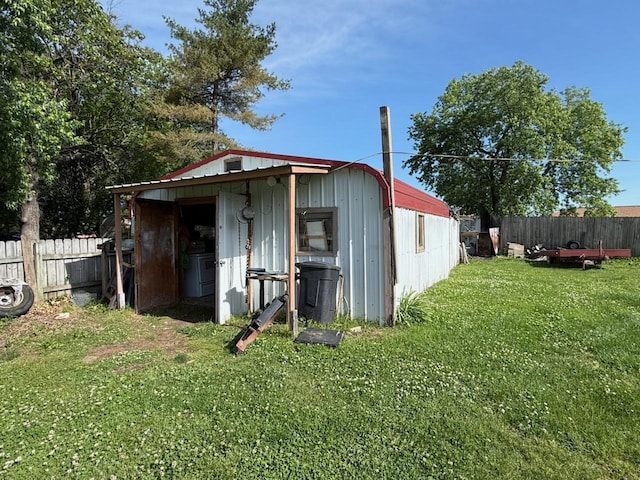 view of shed with a fenced backyard
