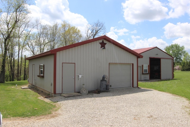 289 Frog Pond Rd, Seymour, MO 65746 - view of outbuilding featuring an attached garage, an outdoor structure, and driveway