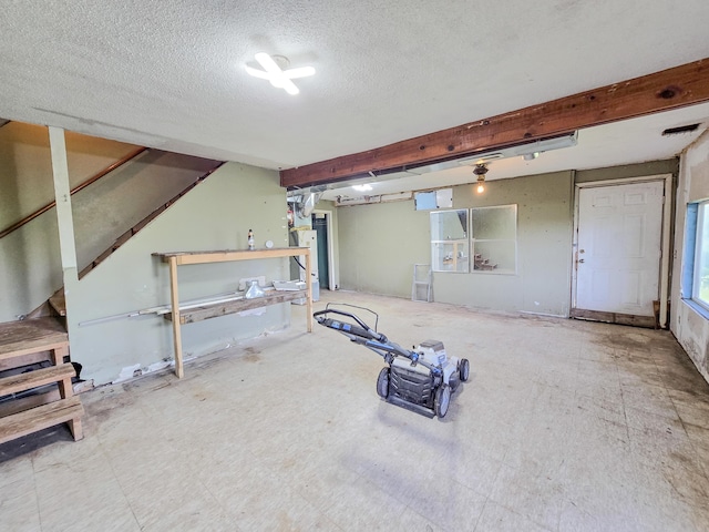 25454 Tulip Pl, Urbana, MO 65767 - interior space featuring a textured ceiling and stairs