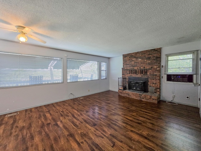 25454 Tulip Pl, Urbana, MO 65767 - unfurnished living room featuring a textured ceiling, visible vents, wood finished floors, and a ceiling fan