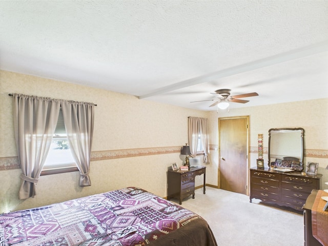 bedroom with light colored carpet and ceiling fan