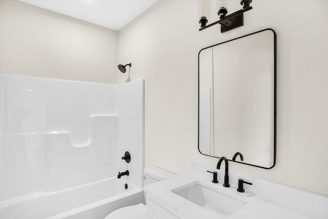 bathroom with toilet, shower / bath combination, and vanity