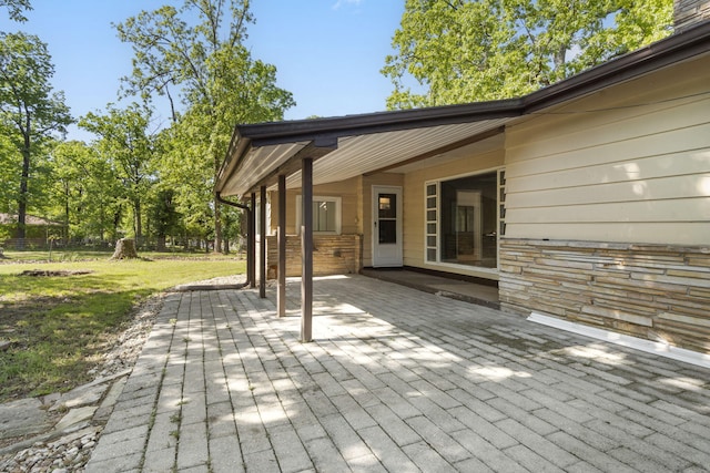 view of patio featuring fence