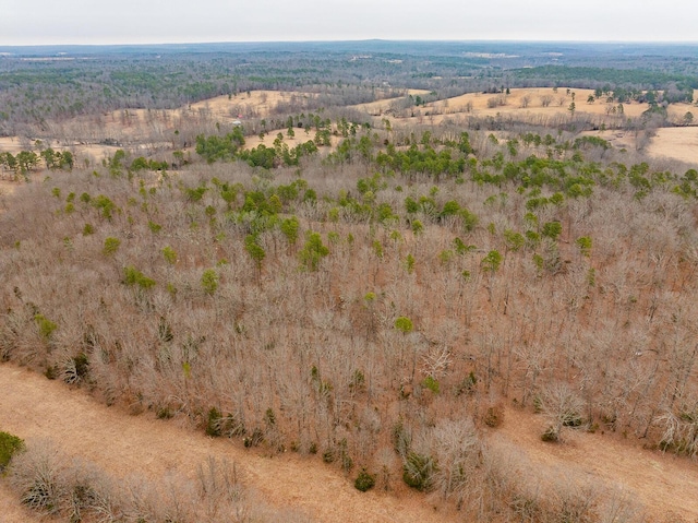 birds eye view of property with a rural view