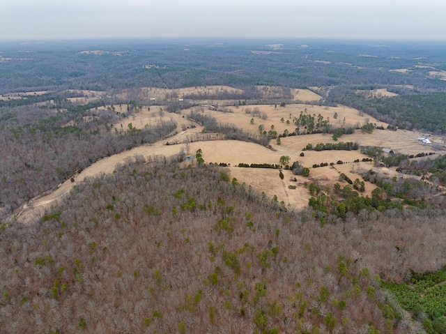 birds eye view of property featuring a rural view