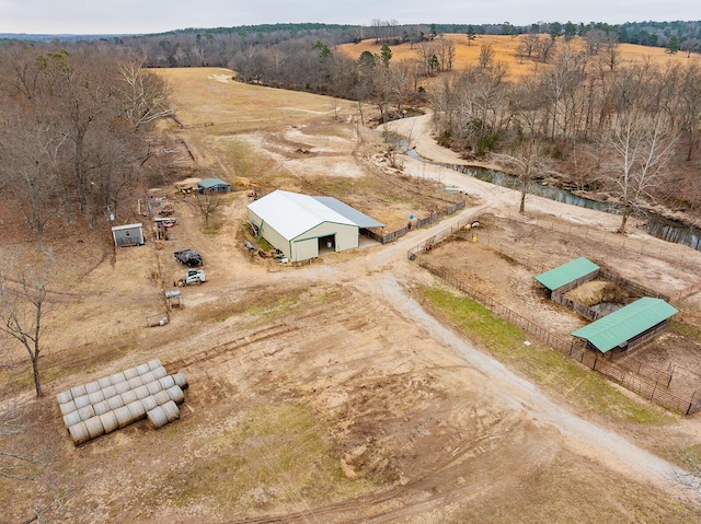 birds eye view of property featuring a rural view