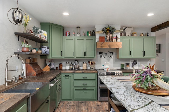 kitchen with a sink, stainless steel appliances, green cabinetry, open shelves, and dark wood-type flooring