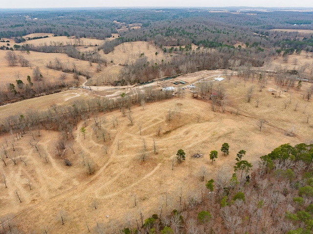 birds eye view of property featuring a rural view