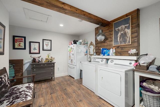 laundry area featuring washer and clothes dryer, wood finished floors, laundry area, attic access, and recessed lighting