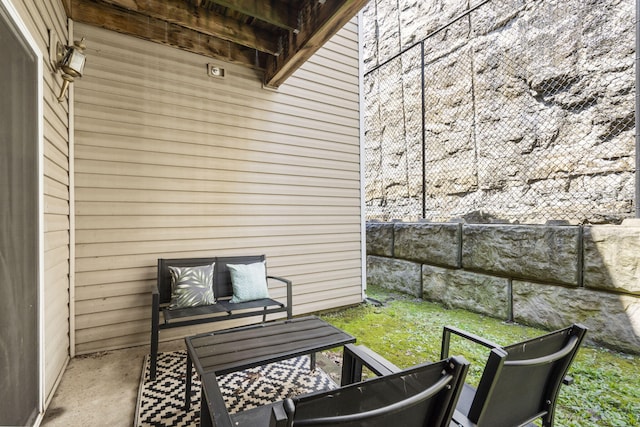 view of patio / terrace with fence