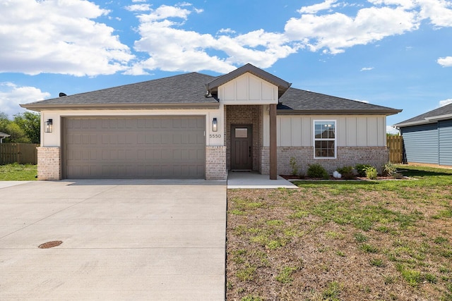 ranch-style home with board and batten siding, brick siding, and driveway