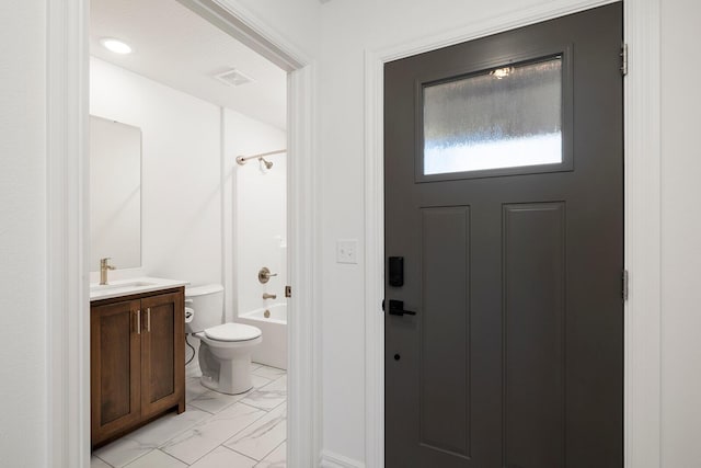 full bathroom with toilet, marble finish floor, vanity, visible vents, and  shower combination