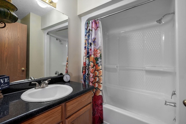 bathroom with shower / tub combo with curtain and vanity