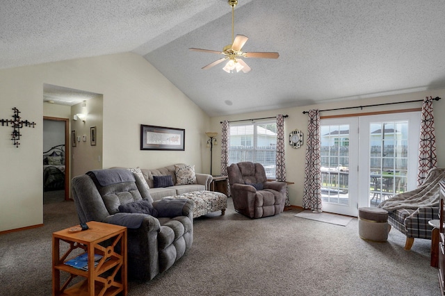 carpeted living area featuring vaulted ceiling, a textured ceiling, baseboards, and a ceiling fan