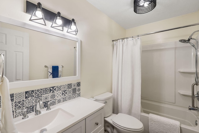 full bath featuring toilet, shower / tub combo with curtain, tasteful backsplash, and vanity