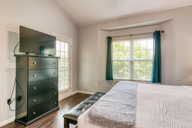 813 Holiday Rdg Unit H-11, Branson, MO 65616 - bedroom featuring baseboards, lofted ceiling, and dark wood-style floors