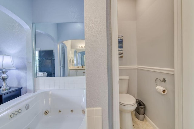 813 Holiday Rdg Unit H-11, Branson, MO 65616 - full bathroom with a tub with jets and toilet