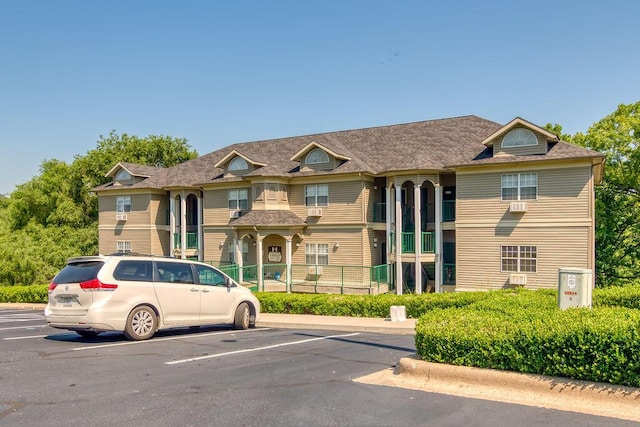 813 Holiday Rdg Unit H-11, Branson, MO 65616 - view of building exterior featuring uncovered parking