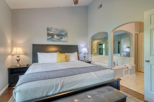813 Holiday Rdg Unit H-11, Branson, MO 65616 - bedroom featuring baseboards, visible vents, and wood finished floors