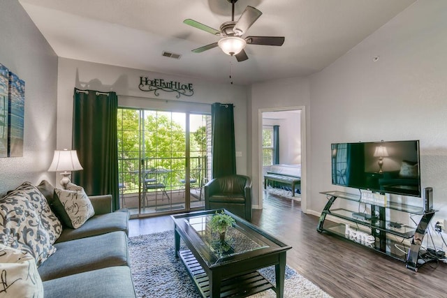 813 Holiday Rdg Unit H-11, Branson, MO 65616 - living area featuring a ceiling fan, baseboards, visible vents, and wood finished floors