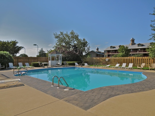 813 Holiday Rdg Unit H-11, Branson, MO 65616 - pool featuring a patio area, a gazebo, and a fenced backyard