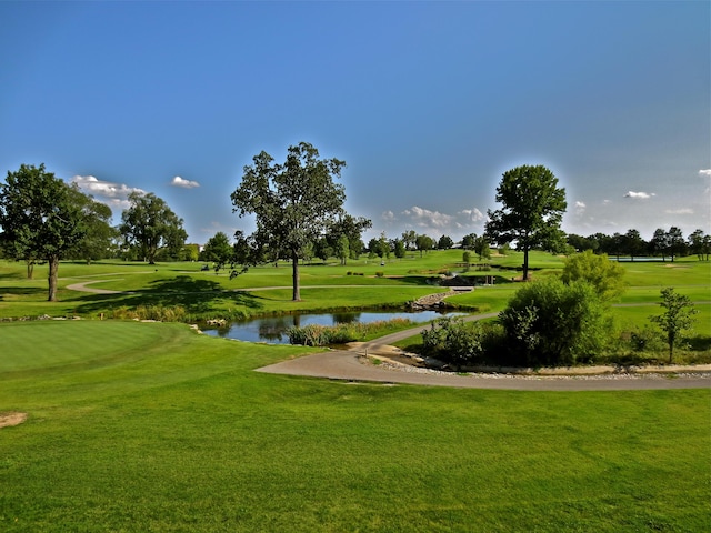 813 Holiday Rdg Unit H-11, Branson, MO 65616 - view of home's community featuring a water view, golf course view, and a lawn