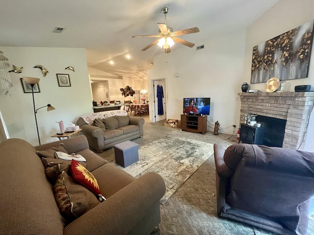 380 Deer Run Rd, Branson, MO 65616 - carpeted living room with a ceiling fan, vaulted ceiling, and a fireplace