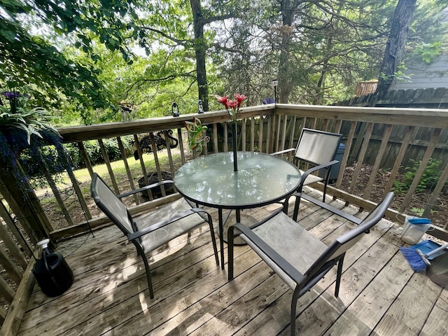 380 Deer Run Rd, Branson, MO 65616 - wooden deck with outdoor dining space and fence