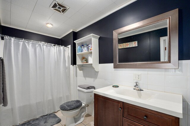 541 S Warren Ave, Springfield, MO 65806 - full bath with a shower with curtain, tile walls, toilet, visible vents, and vanity