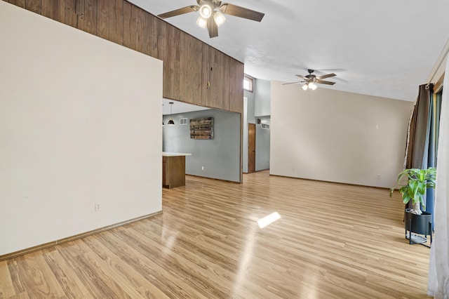408 Meadowlark Rd, Branson West, MO 65737 - unfurnished living room with light wood finished floors, baseboards, a ceiling fan, and visible vents