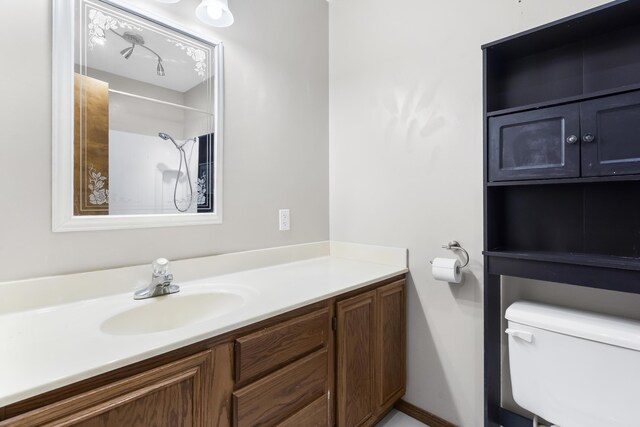 408 Meadowlark Rd, Branson West, MO 65737 - bathroom featuring walk in shower, vanity, and toilet