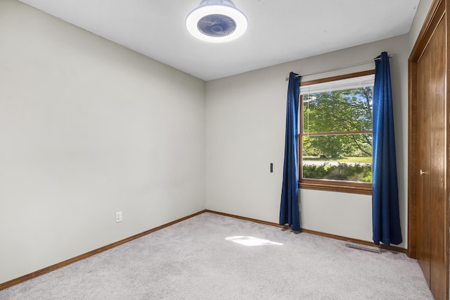 408 Meadowlark Rd, Branson West, MO 65737 - carpeted spare room with baseboards and visible vents