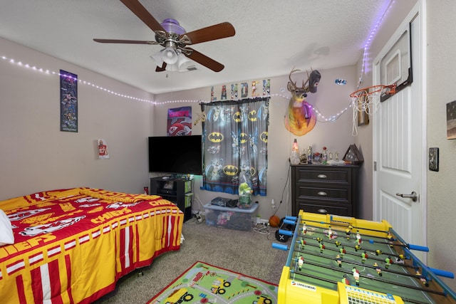carpeted bedroom with a ceiling fan