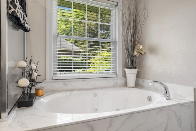 full bath with a jetted tub