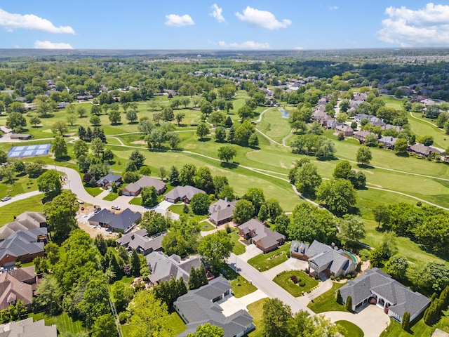 aerial view of residential area with a golf course