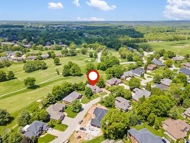 aerial perspective of suburban area with a local golf course