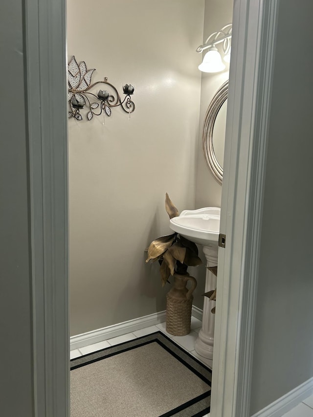 bathroom with baseboards