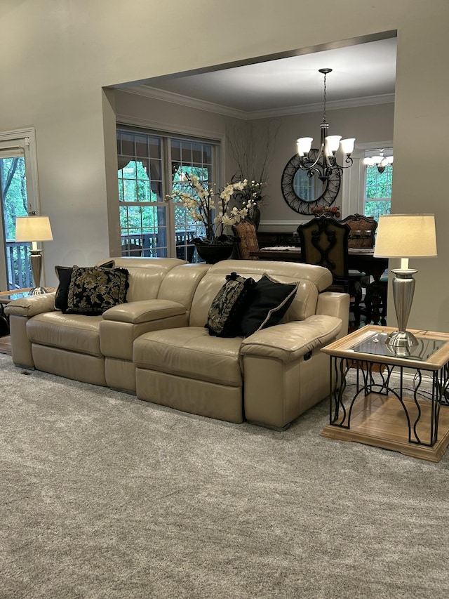 living area featuring a chandelier, crown molding, and carpet flooring