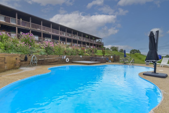 pool featuring fence